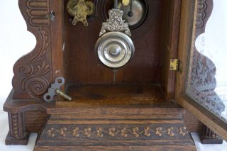 Antique Ansonia Oak Cased Mantel Clock with Key Pendulum Alarm Gingerbread