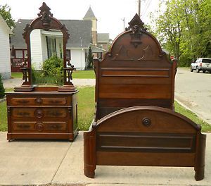 Outstanding Walnut Victorian Two Piece Bedroom Set with Carved Heads Circa 1870