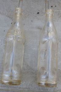Two Different Art Deco Style Embossed Big Chief Coca Cola Bottles 1 Muskogee OK