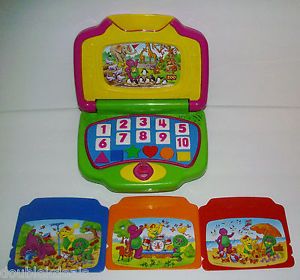 C 2002 Barney PBS Kids Learning Laptop Computer 4 Cartridges Singing Toy