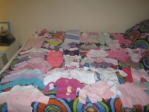 A 78 Piece Lot of New Born Baby Girl Clothes
