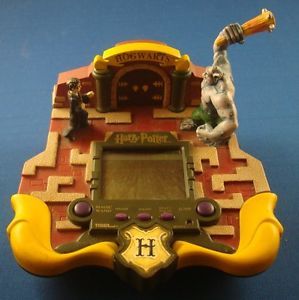 Harry Potter Electronic Handheld LCD Toy Game System Hogwarts w Figurine Tiger