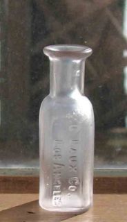 Early Embossed Glass Patent Medicine Bottle C Laux Co Los Angeles California