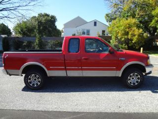 1997 Ford F150 Crew Cab with Third Door Aftermarket Wheels