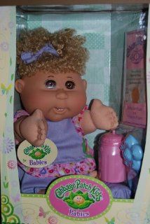 Cabbage Patch Kid Babies Blond Curly Hair Brown Eyes   Sylvia Kira born September 20th Toys & Games